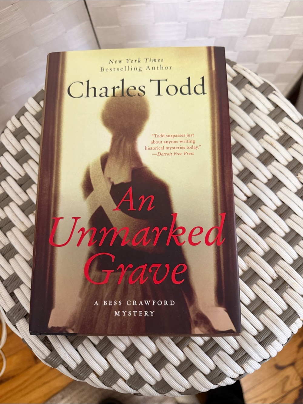 "An Unmarked Grave" Hardcover - Cream and Brown Cover